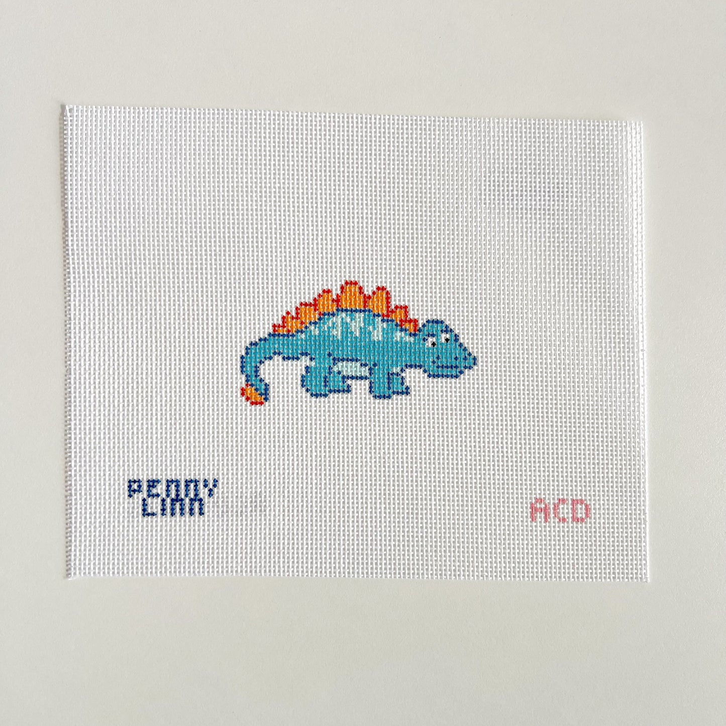 Dino Friends - Blue and Orange Stegosaurus, 18 Mesh, 1.5" x 3" Design Size