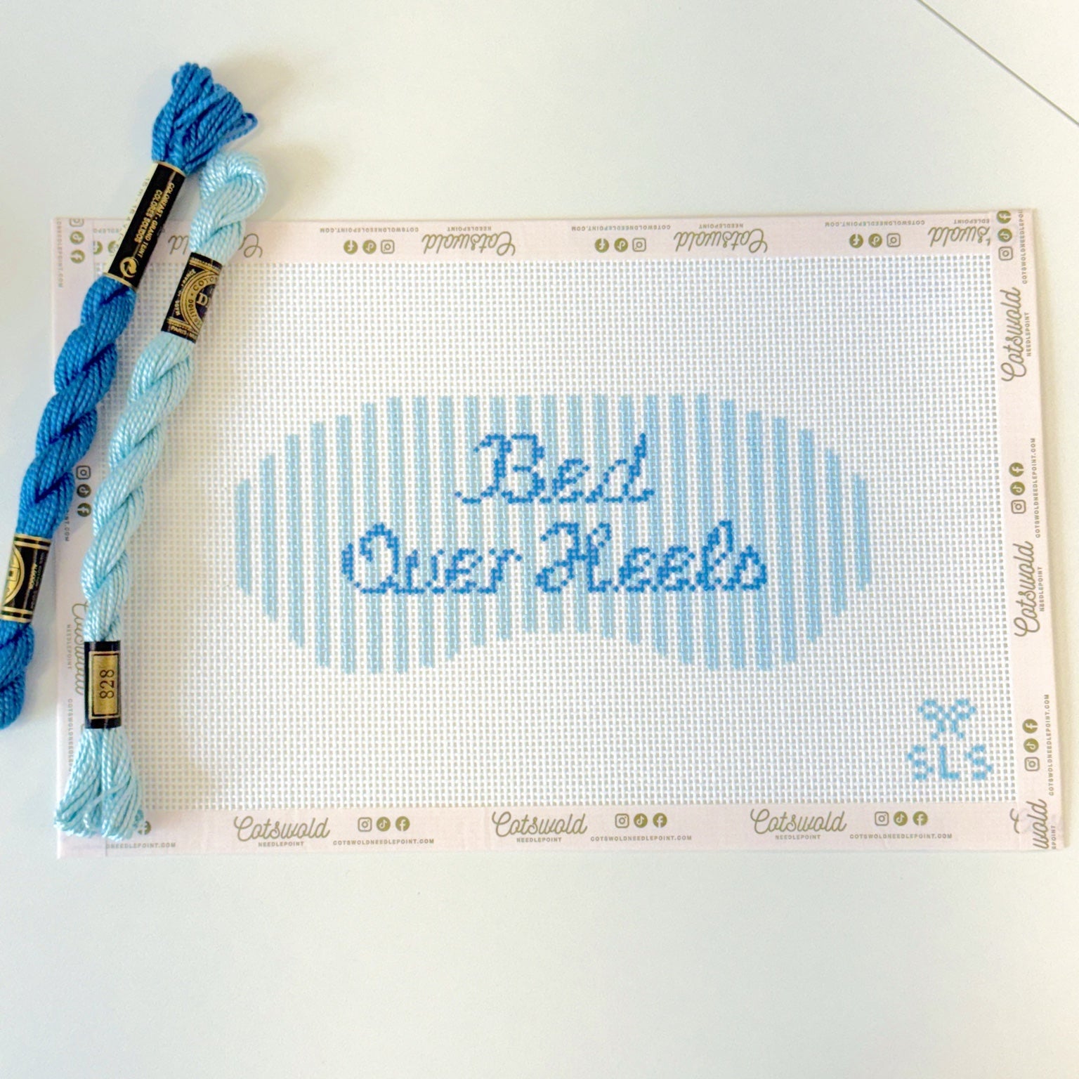 Bed Over Heels blue phrase needlepoint canvas on 13 mesh with coordinating blue threads