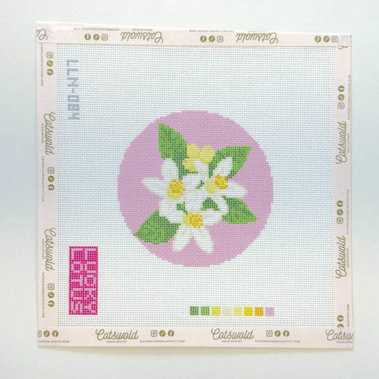 Lemon blossom floral round needlepoint canvas on 18 mesh with white flowers green leaves and pink background