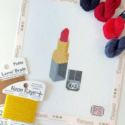 Close-up of red lipstick needlepoint canvas showing 18 mesh painted design details
