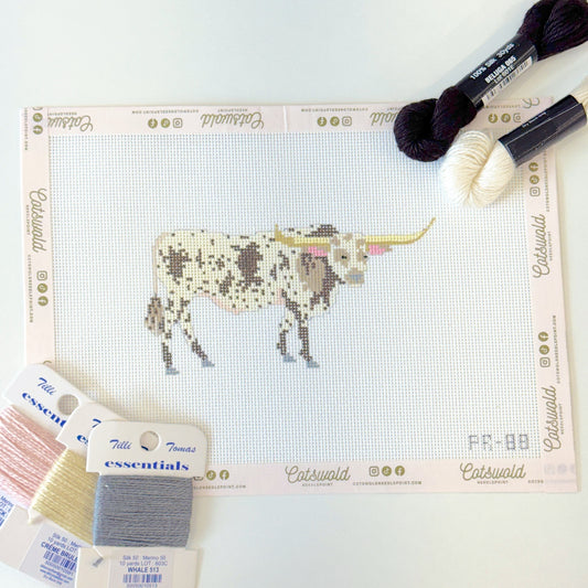 Texas longhorn cow needlepoint canvas on 18 mesh styled with coordinating fibers